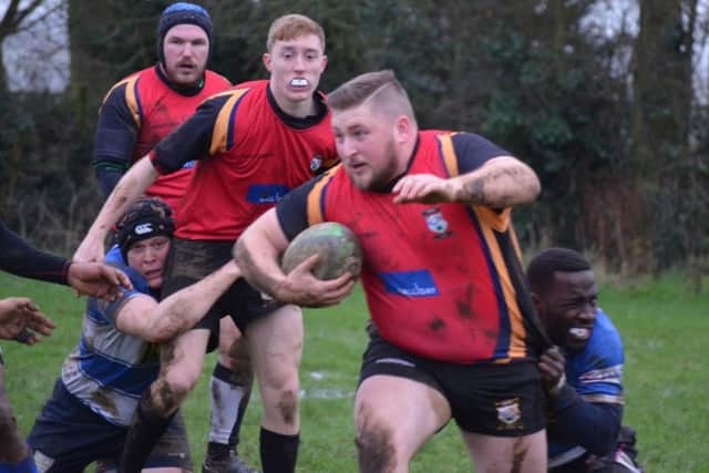 ON THE CHARGE -- Ashfields captain and opening try-scorer Chris Houseman in action at Aylestone St James.