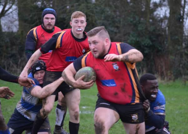 ON THE CHARGE -- Ashfields captain and opening try-scorer Chris Houseman in action at Aylestone St James.