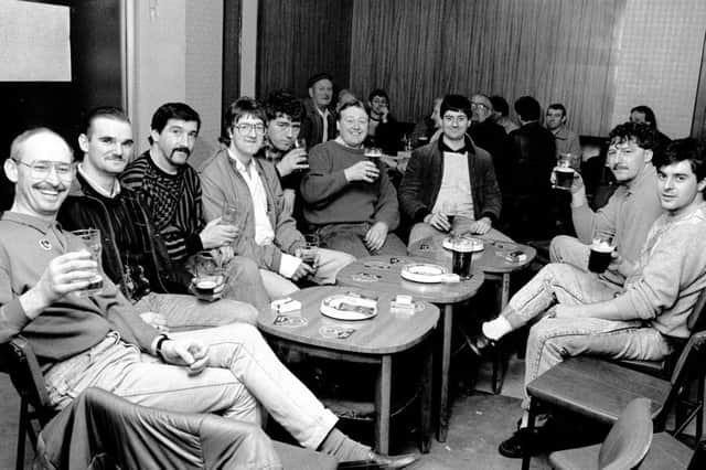 Mansfield Colliery March 1988. Miners have a drink in the welfare after their last shift