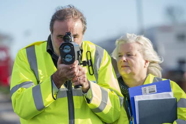 June Stendall with Nottinghamshire Police Commissioner Paddy Tipping getting involved in the SpeedWatch scheme on Sutton Road, Mansfield Woodhouse.