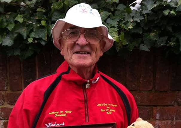 Anthony Allsop from Mansfield now hold the Guinness World Record for being the oldest person to walk from Lands End to John O'Groats, pictured here with Darwin the mascot