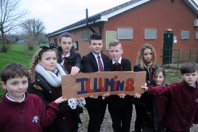 Young campaigners outside the Pavillion , on Shetland Road, Tibshelf, which they want to use as a youth club.