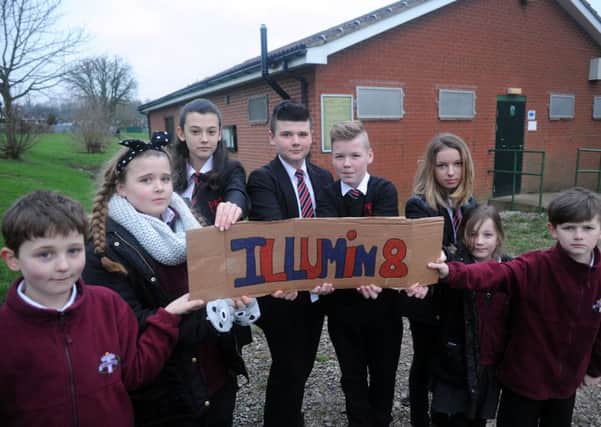 Young campaigners outside the Pavillion , on Shetland Road, Tibshelf, which they want to use as a youth club.