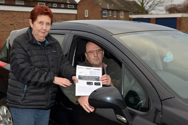 Bilsthorpe couple Angela and David Burditt were fined at St Peter's Retail Park when they were unable to get out of the car park because of traffic
