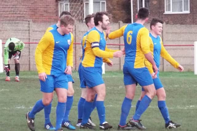 GOAL! -- Teversal celebrate their opening goal on their way to victory at Worsbrough Bridge.