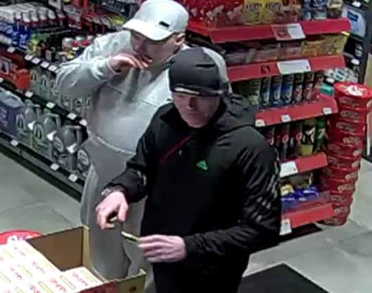 Derbyshire Police are hunting for these two men in connectino with a shop theft from Esso in Langlay Mill on Christmas Day