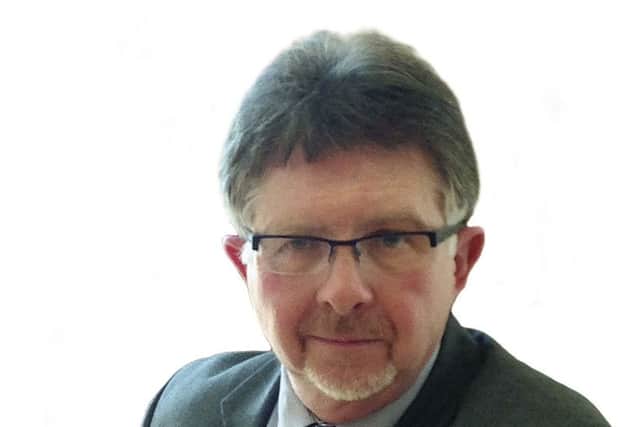 Coun Alan Rhodes