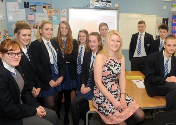 Miss Sam Berridge with her year 11 English class at the Hall Park Academy which is the most improved school in Nottinghamshire.