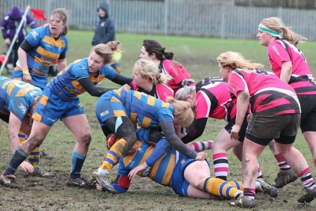 CUP BATTLE -- giantkillers Ashfield Ladies giving their all in a Women's Junior Cup clash against Old Leamingtonians.