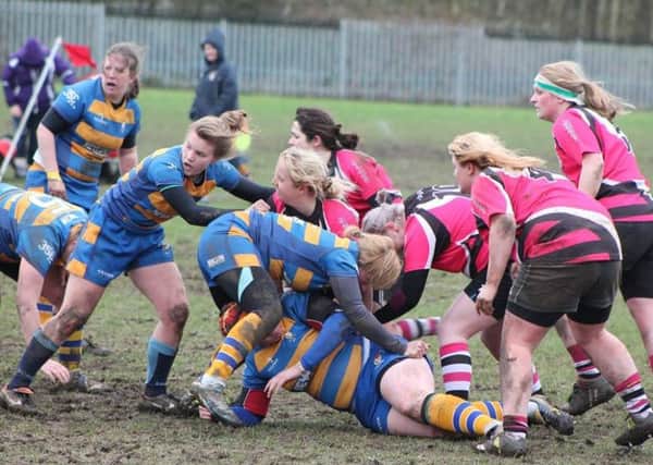 CUP BATTLE -- giantkillers Ashfield Ladies giving their all in a Women's Junior Cup clash against Old Leamingtonians.