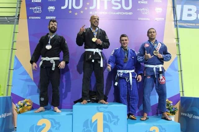 NUMBER ONE IN EUROPE -- Mark Case celebrates his gold medal at the European Championships.