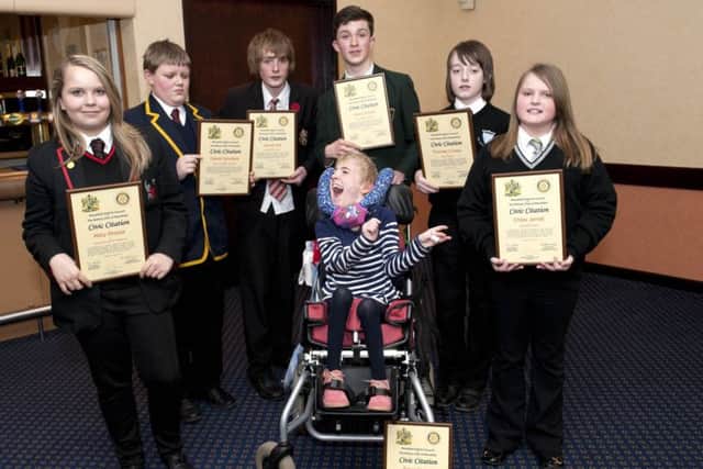 Children of courage at a previous Mansfield Rotary Club ceremony.