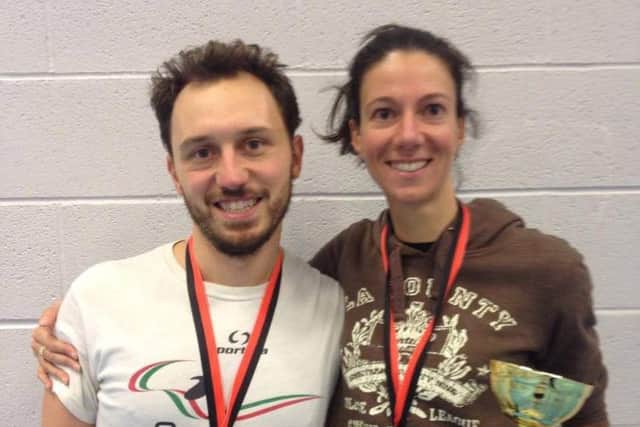 MEDAL WINNERS -- Giulano Punzo and Elena Rainero, of the newly-named Mansfield Fencing Club.