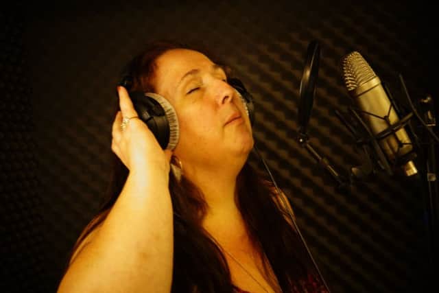 Divina Bates recording her single 'Big & Bootful'