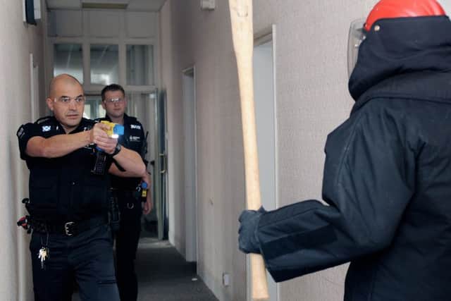 Humberside Police Officers spend the day training to use a Taser Gun-
NBFP PA1339-13e