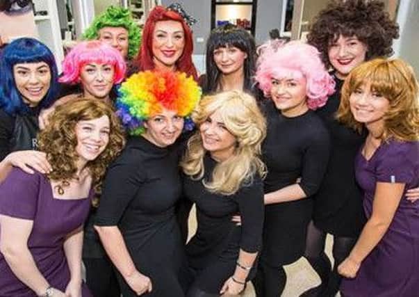 Staff at Hair and Beauty at Slimming World display their hair-raising efforts at the salon in Alfreton
