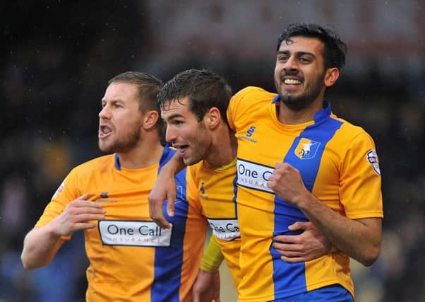 Mansfield Town v Morecambe - Skybet League Two - One Call Stadium - Saturday 6 Feb 2016 - Photographer Steve Uttley

Matty Blair celebrates with Mal Benning and Jamie McGuire