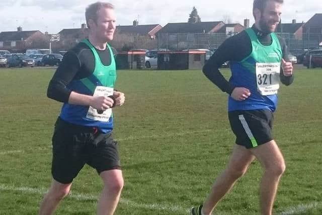 MARATHON MEN -- Mansfield Harriers duo, Matt Bradbury (left) and Martin Fickling, completing the Stamford 30k road race together.