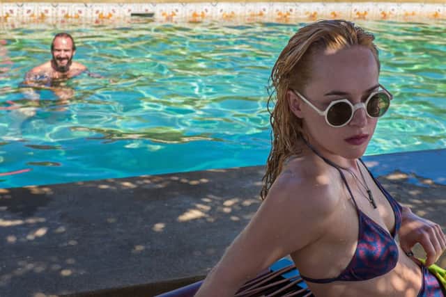 A Bigger Splash. Pictured: Dakota Johnson and Ralph Fiennes. See PA Feature FILM Reviews.: PA Photo/Icon.