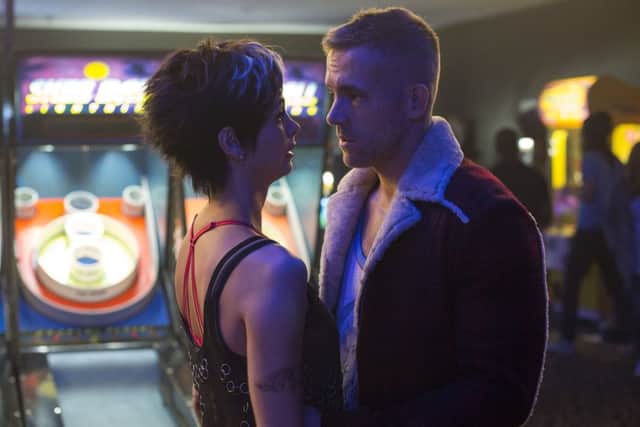 Deadpool. Pictured: Morena Baccarin and Ryan Reynolds.  PA Photo/Fox UK.