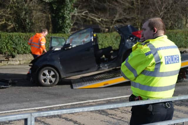 Police cordoned off a section of Sheepbridge Lane, Mansfield, this morning and were still attending as a crashed KIA hatchback was being pulled off the road.