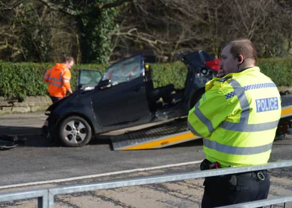 Police cordoned off a section of Sheepbridge Lane, Mansfield, this morning and were still attending as a crashed KIA hatchback was being pulled off the road.
