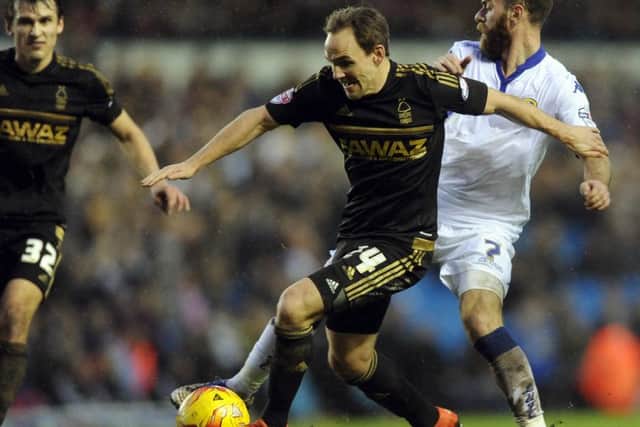 Date:6th February 2016. Picture James Hardisty.Leeds United v Nottingham Forest, pictured Leeds United's Mirco Antenucci, tackles Nottingham Forest David Vaughan.