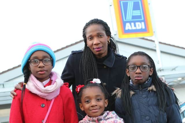 Ebbie Olukoya and her daughters Deborah, Dorothy and Bernice at the Shirebrook branch of Aldi.