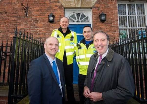 Paddy Tipping, at the right on the front, visits Southwell Police Station.
