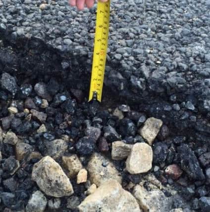 The pothole on Station Road in Shirebrook was more than 30 inches across and four inches deep in places.