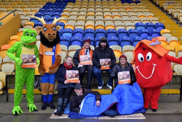 Official launch of Frameworks Big Snore sleep out event at Mansfield Town FC One Call Stadium, pictured with Sammy the Stag are Joe Jowitt, Freddy the Frog, Framework mascot Sarah Cross, Coun John Coxhead, Michelle Hanson, Gary Lawson, Andrea Laund and Craig Ray