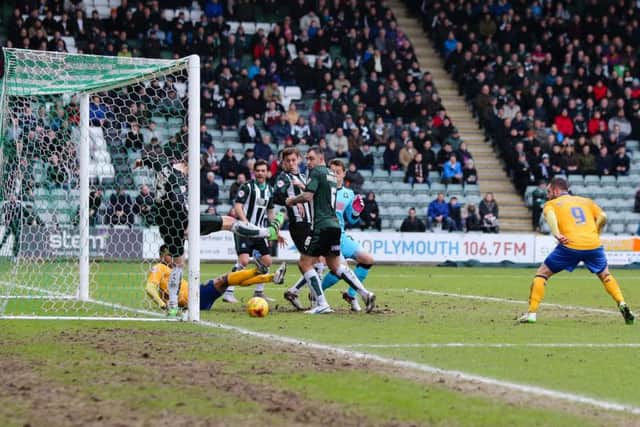 Goal mouth scramble  - Pic Chris Holloway - The Bigger Picture