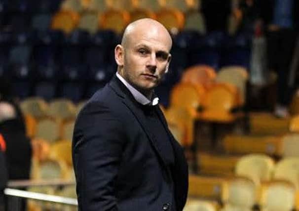 Mansfield Town manager Adam Murray.