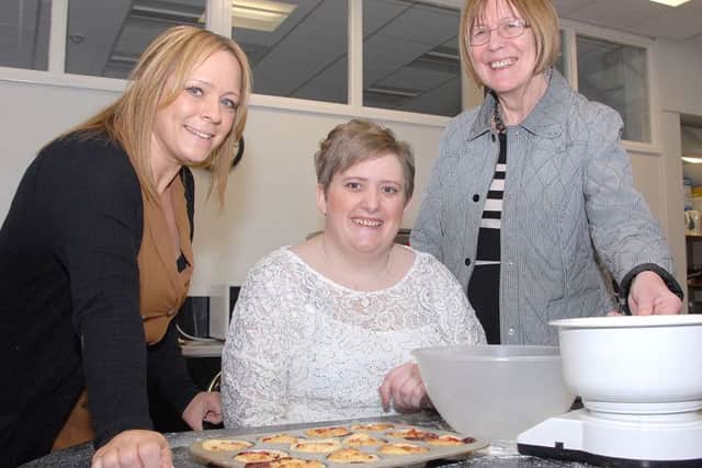 Susie Johnson, centre, pictured with Support WorkerJanet Cox, right, and County Coun Muriel Weisz, Chairman of the Adult Sociel Services Committee