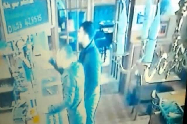 A screenshot of CCTV  footage from the Pheasant Inn pub in Mansfield where thieves stole a charity box from the bar