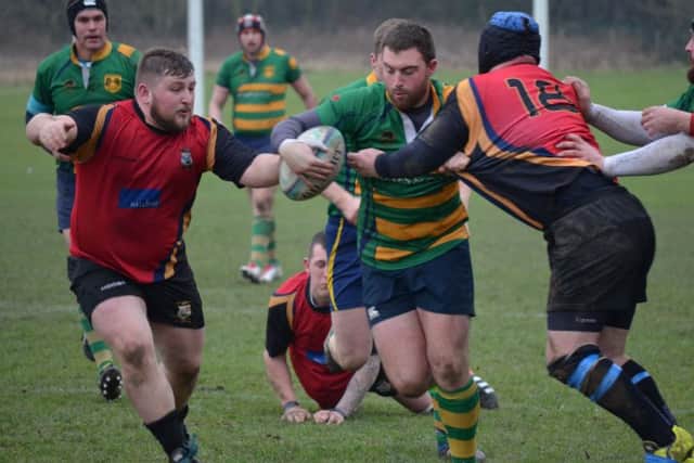 SHOWSTOPPERS -- Ashfields Andy Bennett (left) combines with teammate Chris Houseman to stop another East Retford attack during the NLD Vase semi-final,