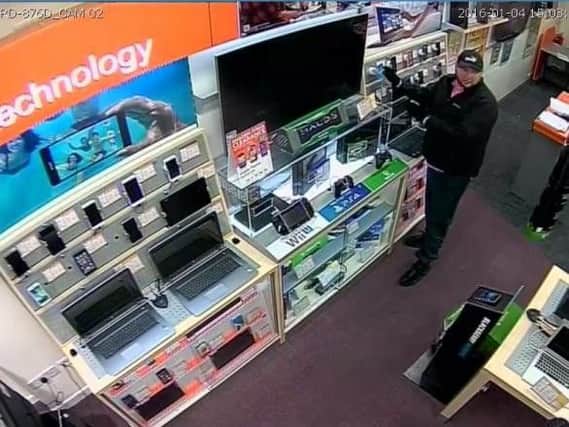 Police want to speak to this man in connection with a theft at a Mansfield store.