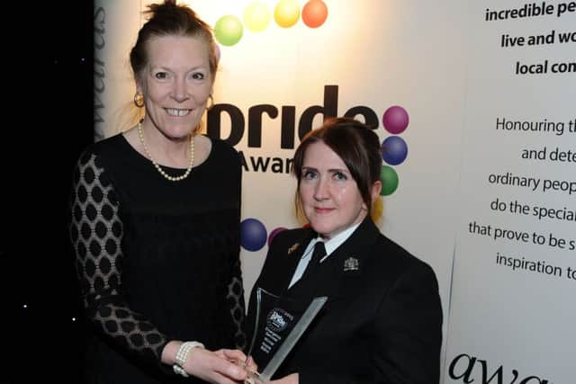 Chad Pride Awards.      P.C. Nicola Bland is present with her Emergency Services award by Coun. Joyce Bosnjak on behalf of The Peaceful Uhuru Trust who sponsored the award.