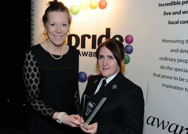 Chad Pride Awards.      
P.C. Nicola Bland is present with her Emergency Services award by Coun. Joyce Bosnjak on behalf of The Peaceful Uhuru Trust who sponsored the award.