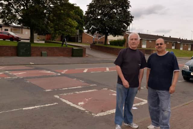 Shop owners on Ladybrook Lane want the speed bumps removing, pictured are Terry Cook and Kalpesh Bhatt