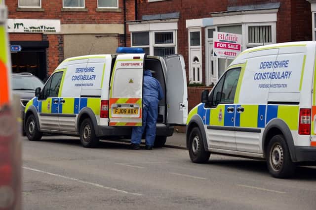 Police outside the house on Station Road where the women's bodies where discovered