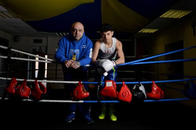 Nico Leivars, 16, Stags Boxing Academy, Mansfield, pictured with Head Coach Jules Leivars