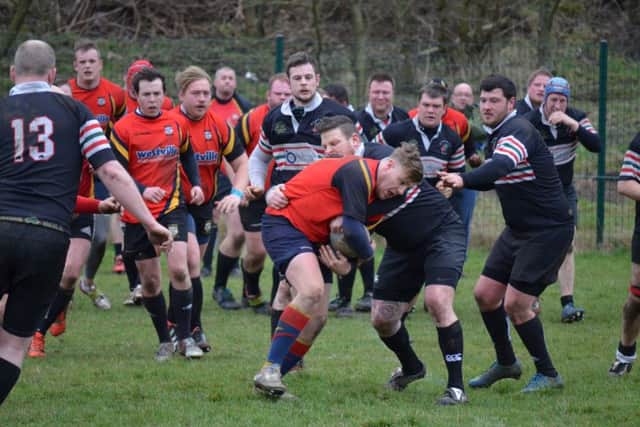 ON THE CHARGE -- Kenny Lang leads the victory march by Ashfield RUFCs development squad against North Hykeham, which ended in a 39-0 whitewash triumph to round off their season in the league.