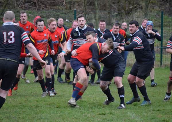ON THE CHARGE -- Kenny Lang leads the victory march by Ashfield RUFCs development squad against North Hykeham, which ended in a 39-0 whitewash triumph to round off their season in the league.