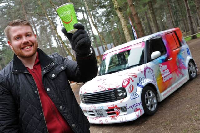 Frankie with his Coffee Cube Company vehicle.