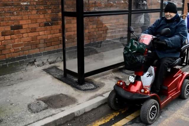 Elderly, disabled and parents pushing prams were forced into the road by a new bus stop built too close to a brick wall.