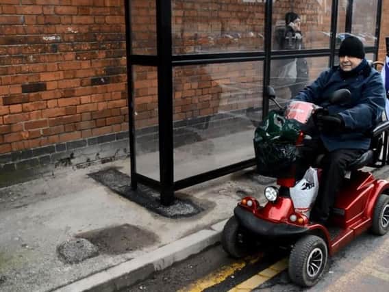 Elderly, disabled and parents pushing prams were forced into the road by a new bus stop built too close to a brick wall.