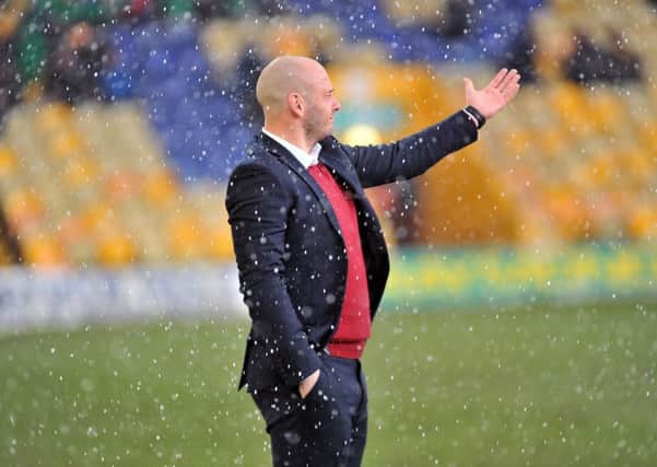 Adam Murray shouys on in the hail

Mansfield Town v Yeovil Town - Skybet League Two - One Call Stadium - Saturday 20 Feb 2016 - Photographer Steve Uttley