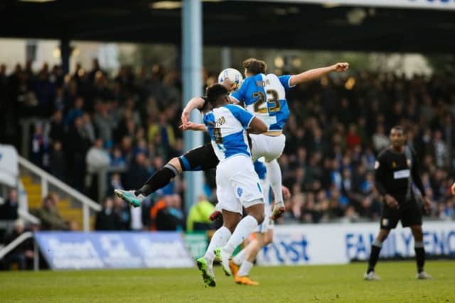 Mansfield Town's Chris Beardsley under pressure from the Bristol defence - Pic Chris Holloway