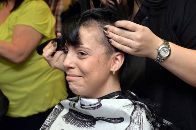 Four friends have had their heads shaved to raise money for Chesterfield Cancer Unit
